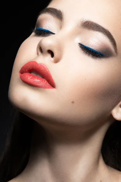 Beautiful woman with evening make-up, red lips. Beauty face.