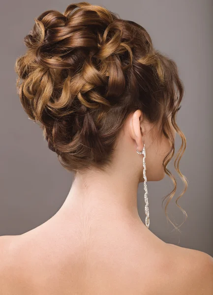 Premium Photo  Close-up of the bride's hairstyle. curls. jewelry