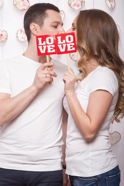 Young, beautiful woman and man in love on Valentines Day, Laughing Happy Lovers, showing different poses.