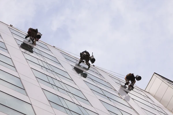 Climbers clean the windows