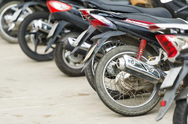 Rows of motorbikes parked outside a public building in Nha Trang.