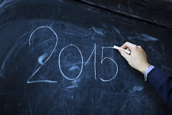 The student writes on a board - 2015