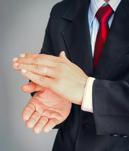 Businessman in suit with red tie