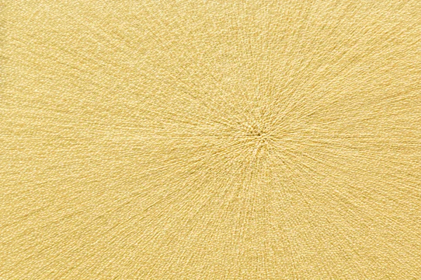 Abstract gold background with gold metal particles .