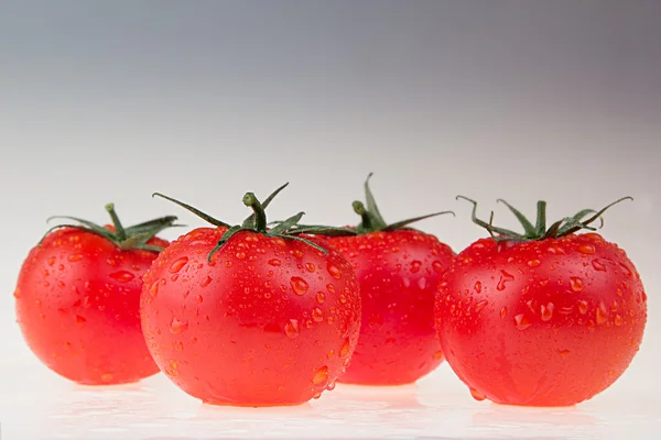 Border of tomato on a white background.  Macro. Texture. Gradient. Tomato pattern. Food background.