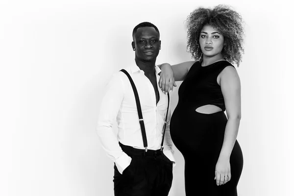 Beautiful and elegant couple expecting baby black and white