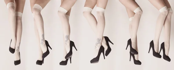 Female legs wearing parisian stockings and heels composition