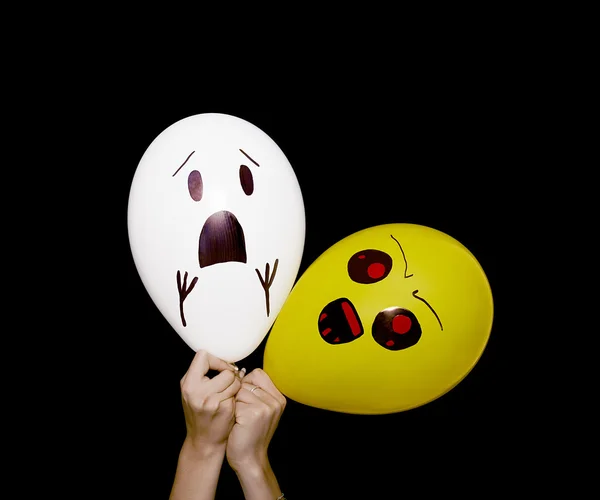 Evil and scared balloon characters