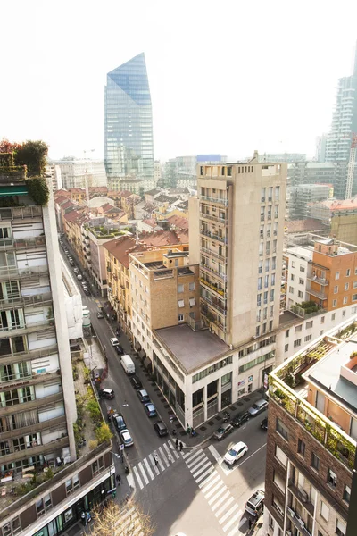 Milan streets, buildings and Diamond Tower seen from above