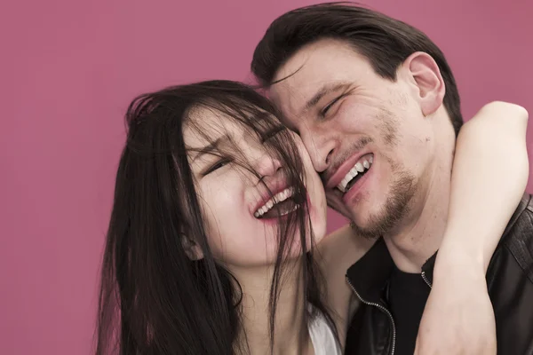 Happy girl portrait with messy hair and her boyfriend