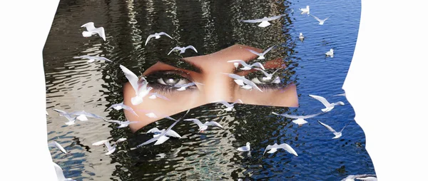 Double exposure of woman wearing burqa and seagulls letterbox
