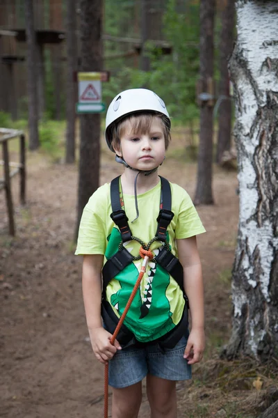 Boy in helmet and travel gear