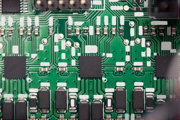 Close up of green system board with microchips