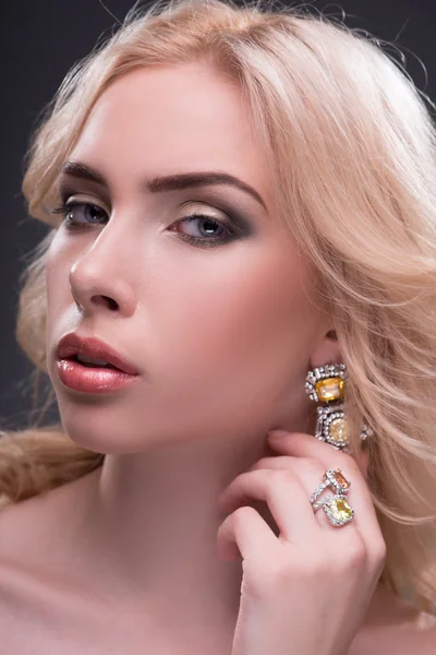 Wonderful blonde wearing jewelry