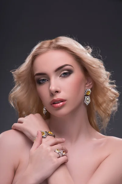 Wonderful blonde wearing jewelry