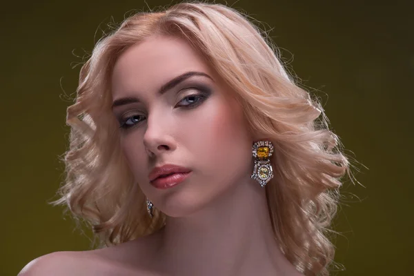 Wonderful blonde wearing jewelry