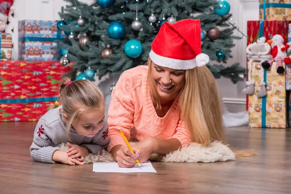 Mom and daughter waiting for Christmas