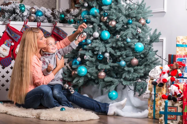 Mom and daughter waiting for Christmas