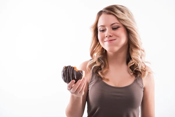 Half-length portrait of pretty smiling blonde dark-haired woman