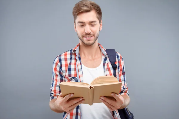 Nice student holding book