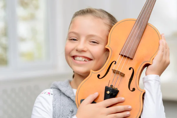 Nice girl playing the violin