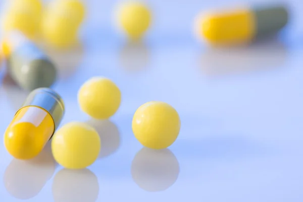 Coloured pills of different shape