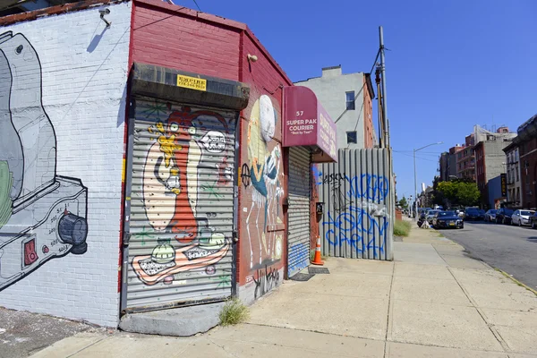 Graffiti shown on a city street in Brooklyn, New York USA