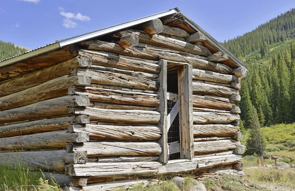 Vintage Log cabin in old abandoned mining town