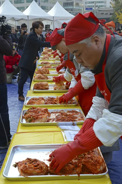 Seoul. November 16, 2014. The recently held Kimchi Making & Sharing Festival involves the important Korean tradition of Gimjang, to ensure families have enough kimchi to get through the long winter.