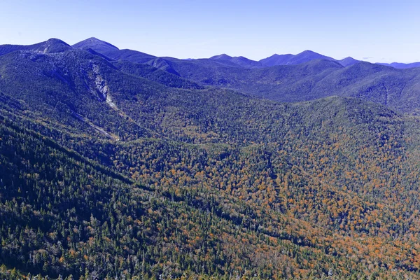 Alpine scene on climb of Gothics Mountain, in Autumn with forest colors in the distance, Adirondacks, New York