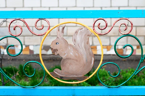 Rabbit in the garden fence