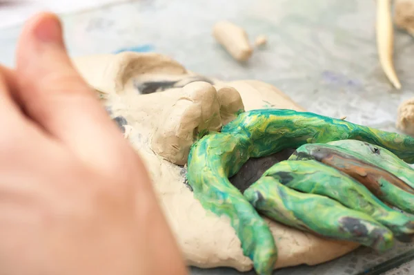 Ssculpting with plasticine