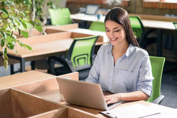 Nice girl working in the office