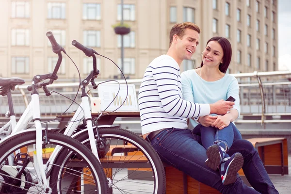 Couple listening to music on the smartphone