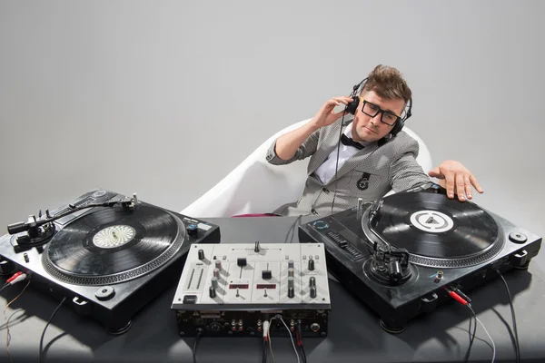 Dj at work in bath isolated on white background