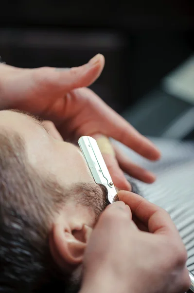 Old-fashioned male shaving