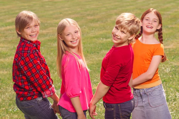 Smiling children standing together