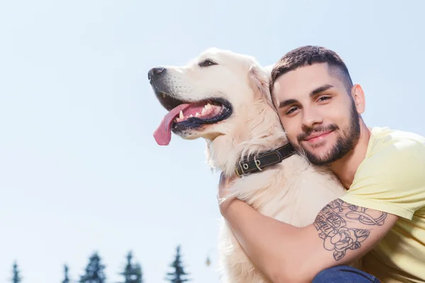 Handsome guy with his dog