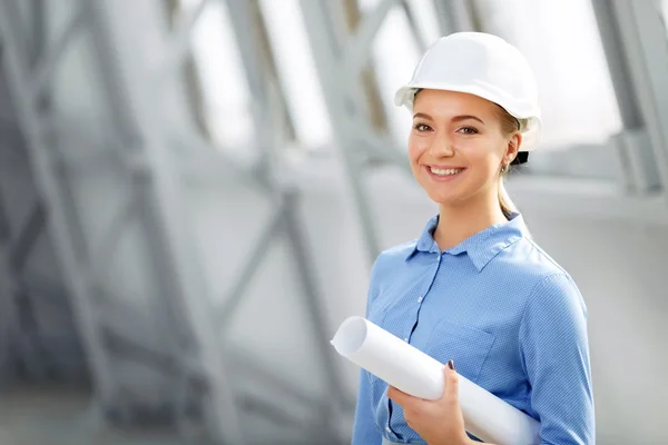 Pleasant woman architect at work