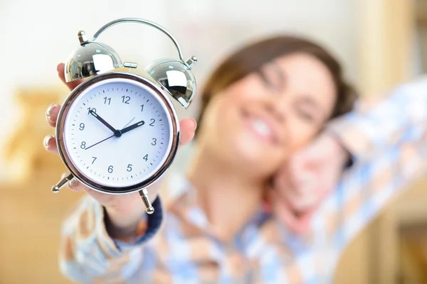 Clock showing an afternoon time.