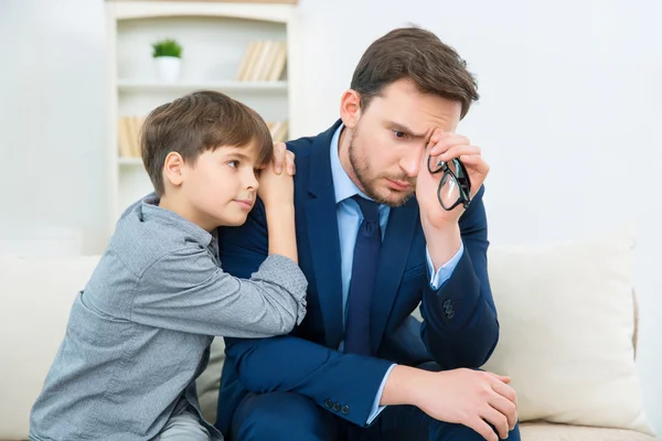 Father is considering problems with son