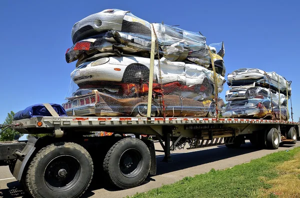 Crushed cars headed to salvage and recycling