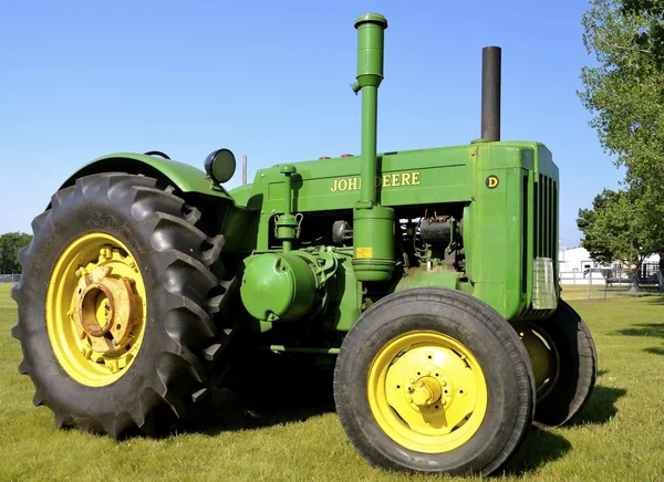 A john Deere D tractor is restored