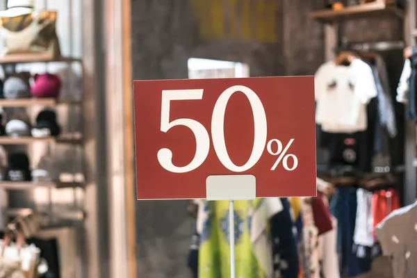 Discount signboard in clothes shop