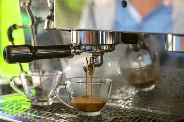 Preparing espresso in coffe machine