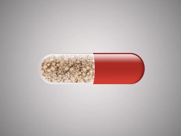 Skulls in pill capsule red
