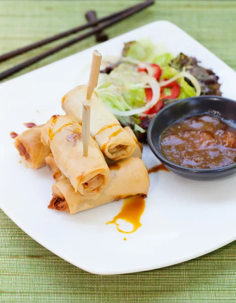 Spring rolls with vegetables, mango chili sauce