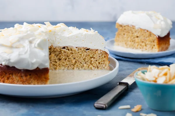 Three milk cake, tres leches cake with coconut. Traditional dessert of Latin America.