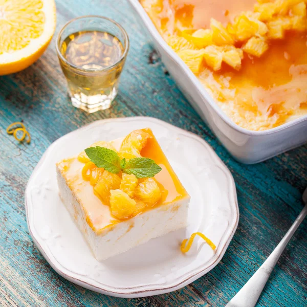 Cheesecake, cottage cheese pudding with fresh oranges, marmalade, jam glaze.