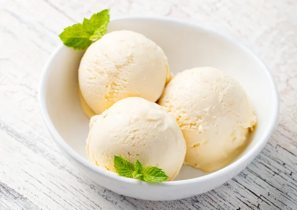 Vanilla Ice Cream with Mint in bowl Homemade Organic product
